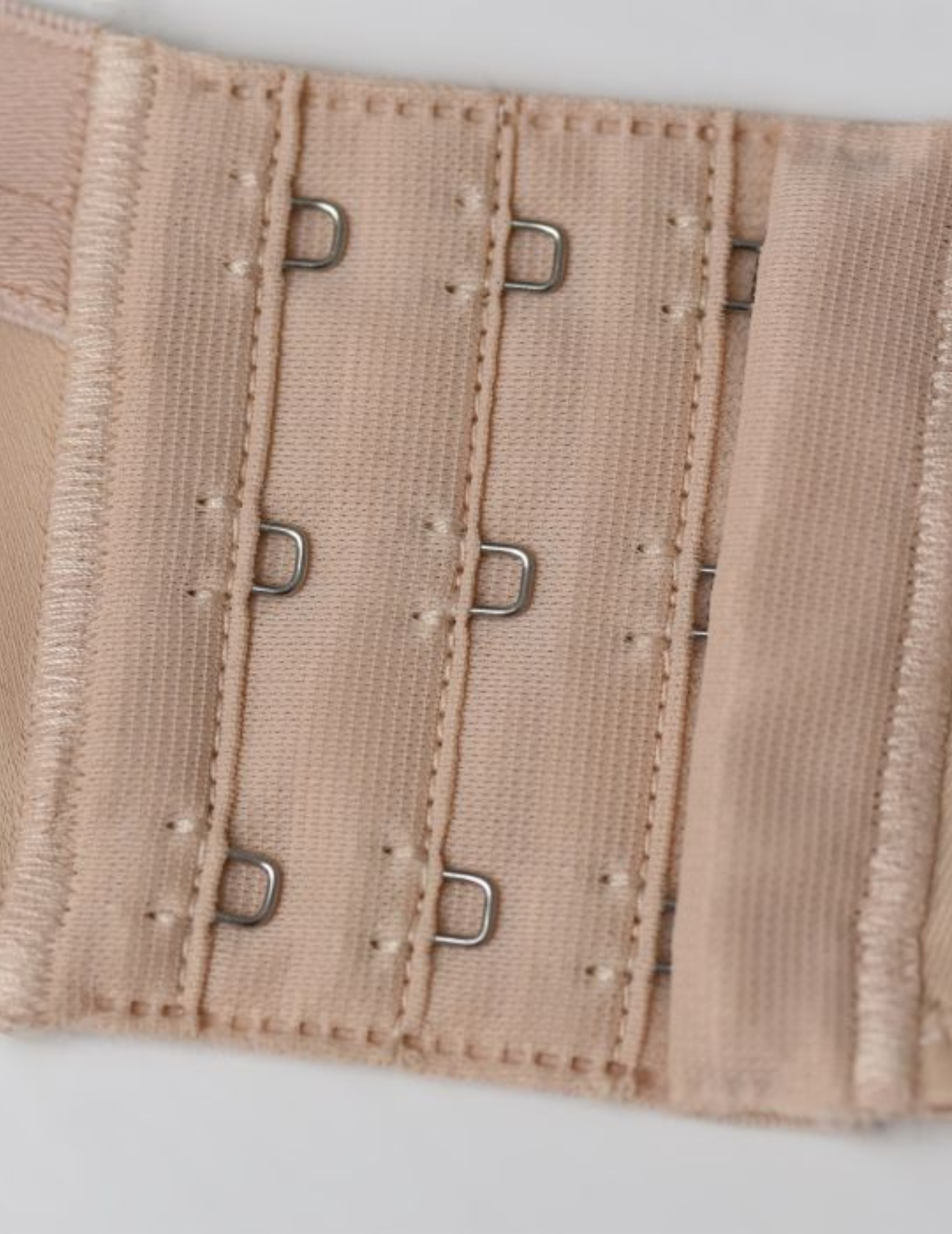closeup us beige bra hook and eye clasps