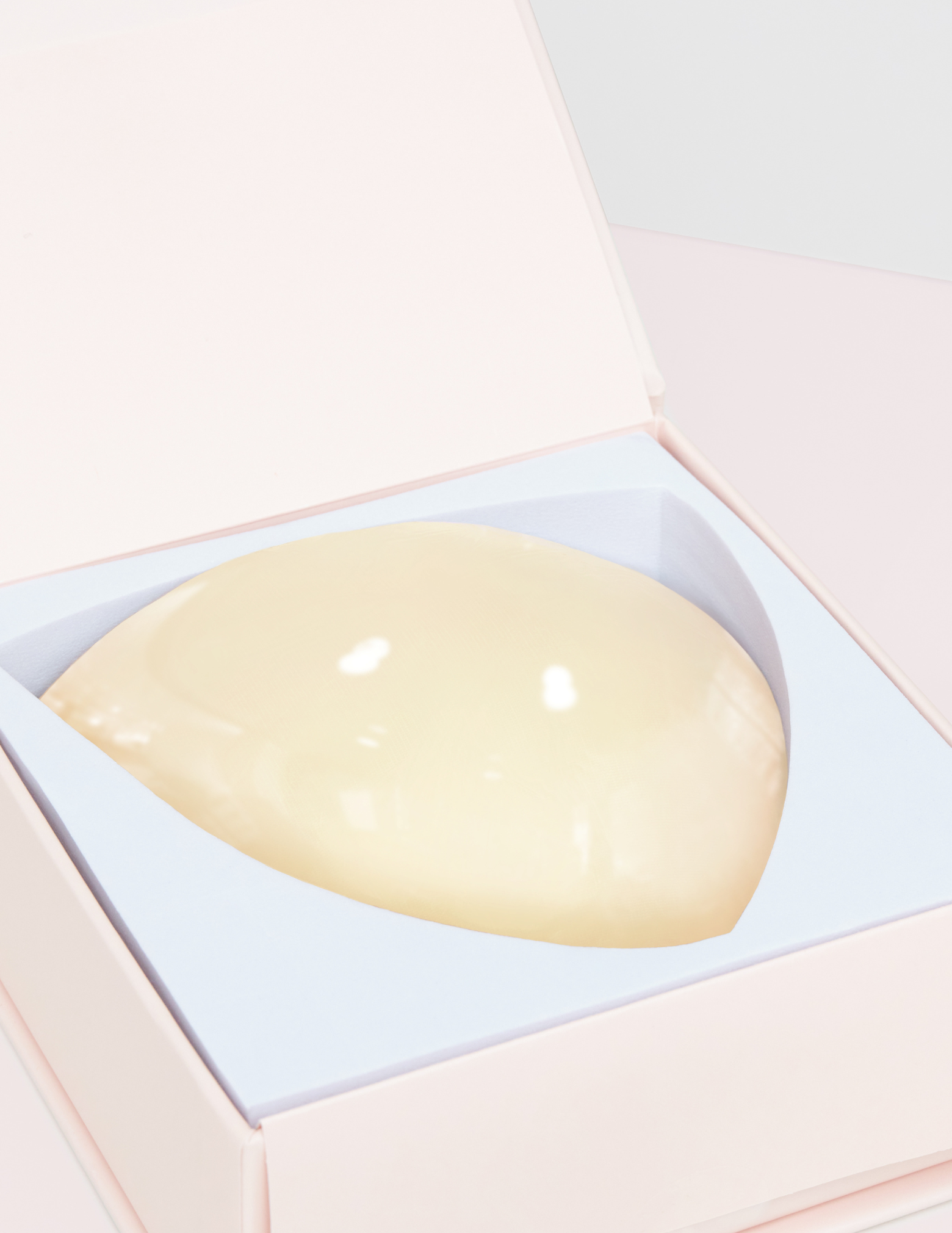 light beige ultra boost insert in pink box