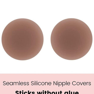 circular adhesive nipple cover front view, medium dark nude