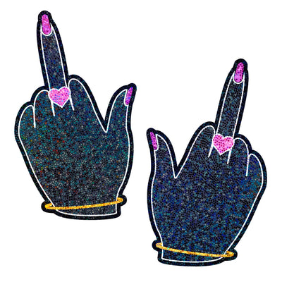 glittery middle finger hand shaped nipple covers with gold bracelets and pink nails and rings,